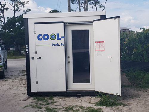 front facing image of doors to cool binz portable office with right side door open