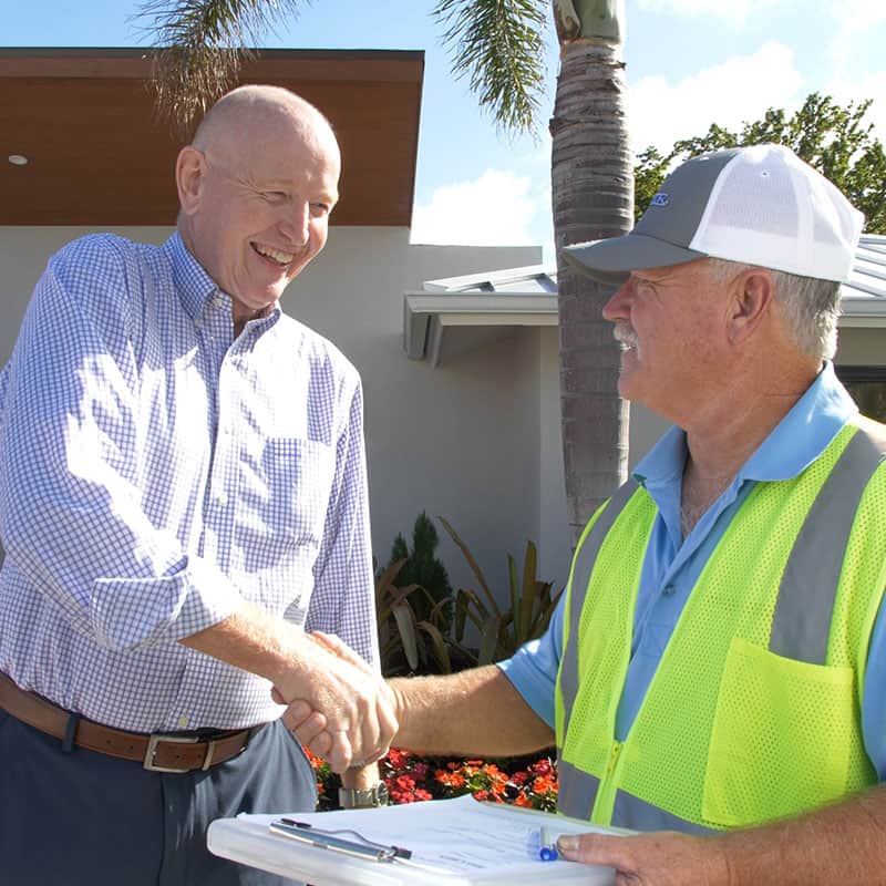 Cool-Binz technician and customer shaking hands