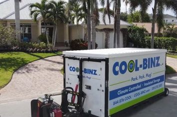 Climate controlled container in driveway